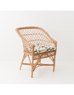 Fauteuil en osier Antonin avec coussin fond gris feuillage blanc