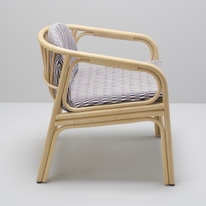 Fauteuil de table en rotin Hublot tissu Marquetry vu de côté