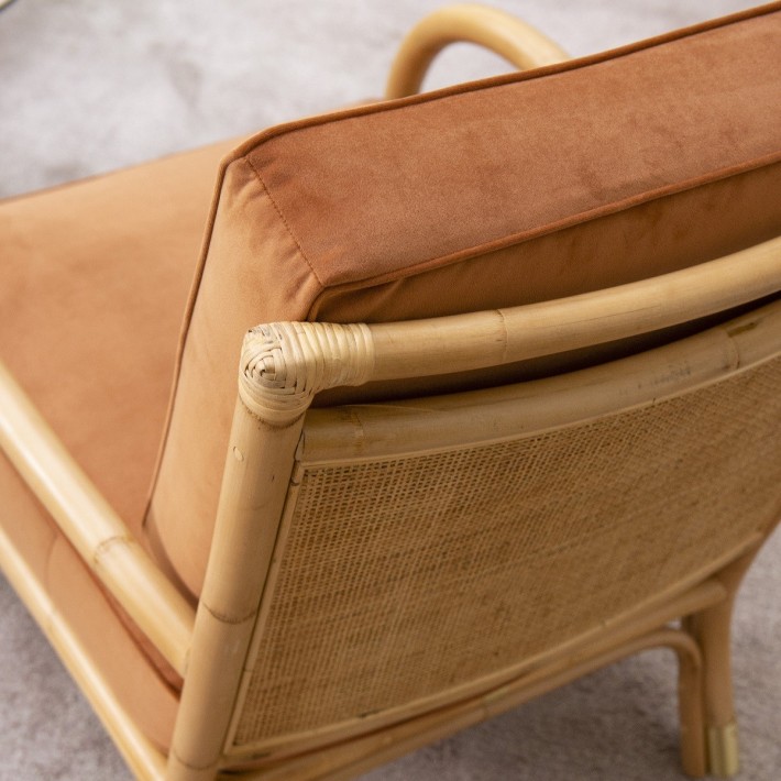 Riviera rattan armchair with orange velvet