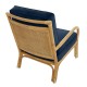 Riviera rattan armchair with blue velvet