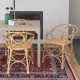 Fauteuil de table en rotin Gingko Bulles ambiance autour d'une table avec fauteuil en rotin gingko Horizon