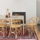Fauteuil de table en rotin Gingko Horizon ambiance autour d'une table