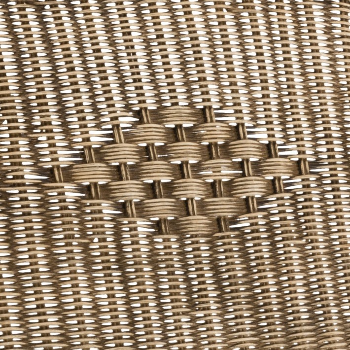 Nantucket distressed woven rattan armchair with diamond pattern backrest detail