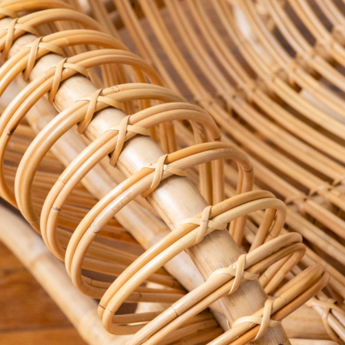 Boucle armchair in rattan designed by the At Once studio for Kok maison zoom armrest