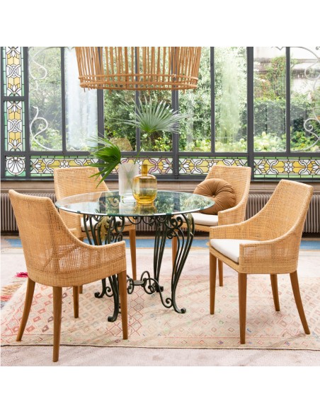 Rattan cane chairs around a table from the Saigon collection by Kok maison