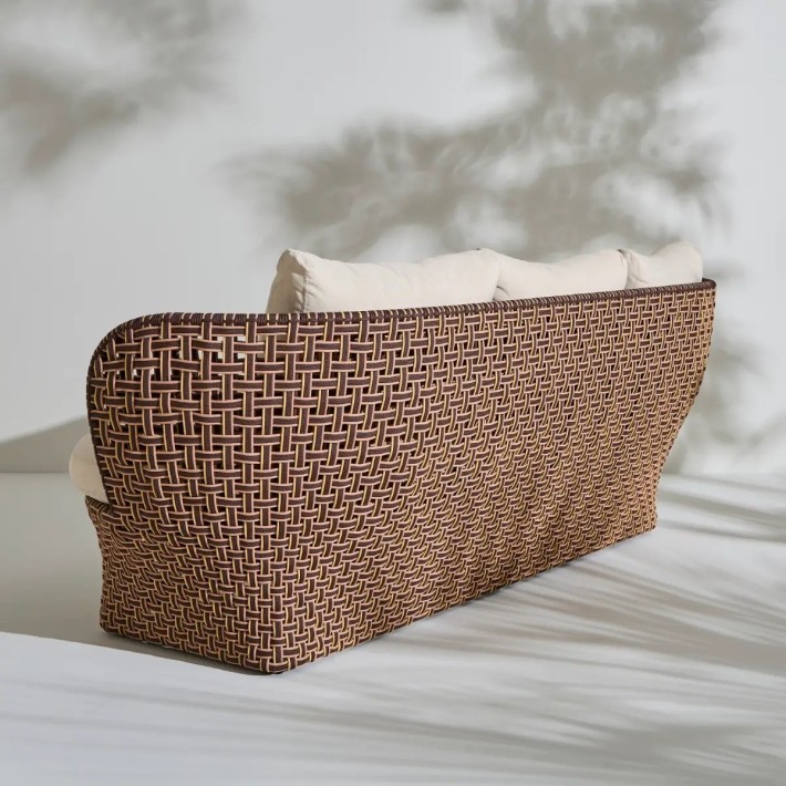 View 3/4 back of the outdoor sofa from the TALI collection