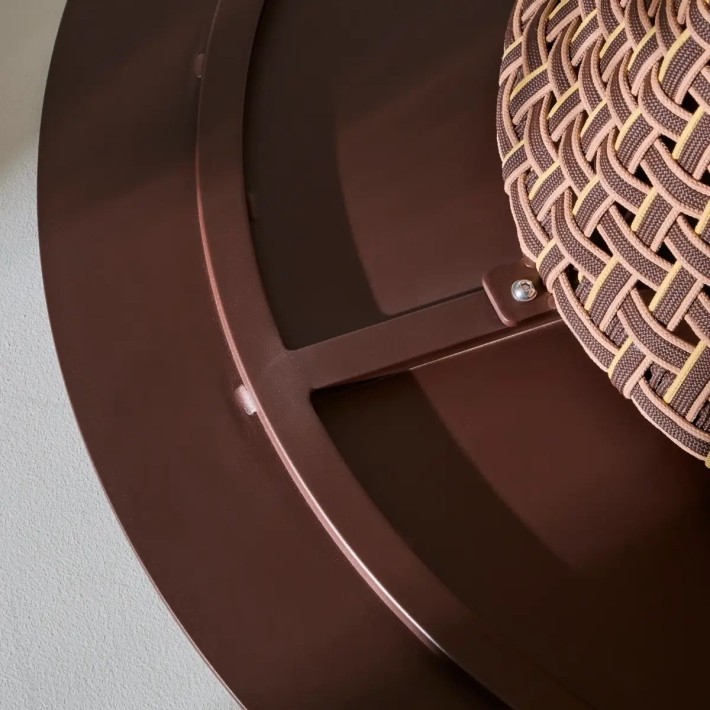 Detail of the fastening system for the metal top of the TALI outdoor round dining table