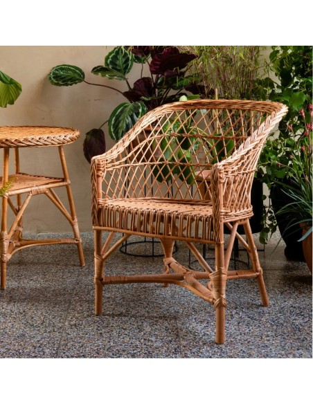 Antonin openwork wicker armchair in room setting Antonin openwork wicker armchair in room setting