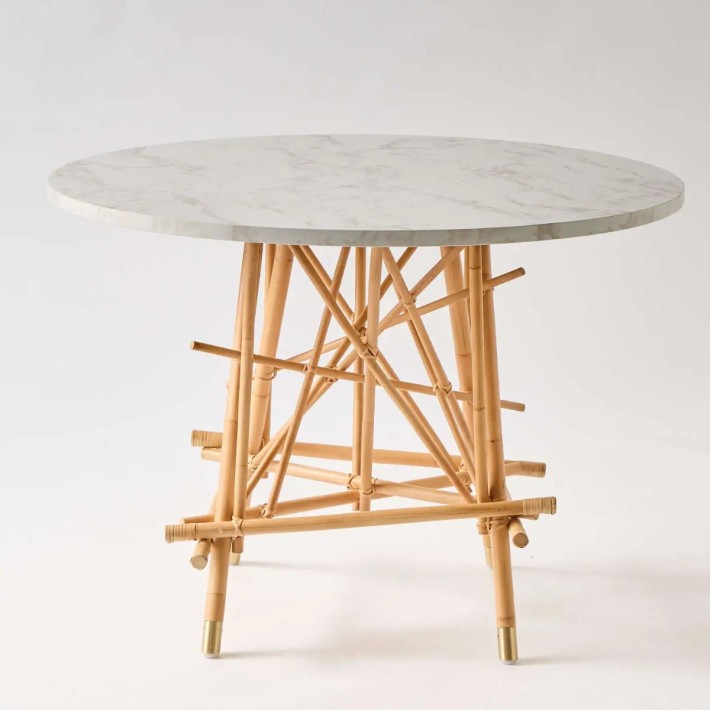 Front view Mikado round rattan table with marble-effect laminate top
