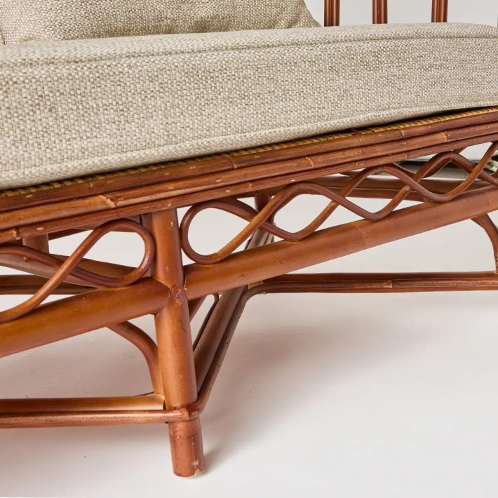 Zoom in on the front structure of the Bagatelle two-seater woven rattan sofa