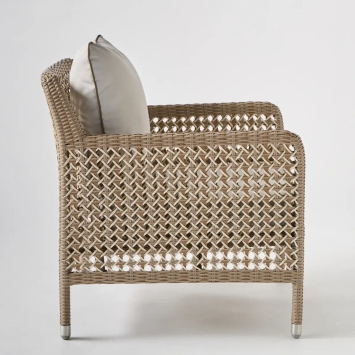 Profile view outdoor woven resin armchair ANTIBES RECIF