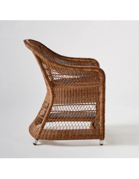 Profile view Biarritz armchair in châtaigne coloured resin