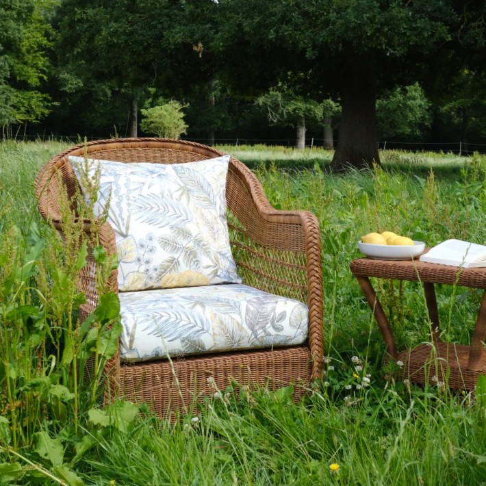 Ambiance Biarritz chestnut armchair with beige bouquet fabric
