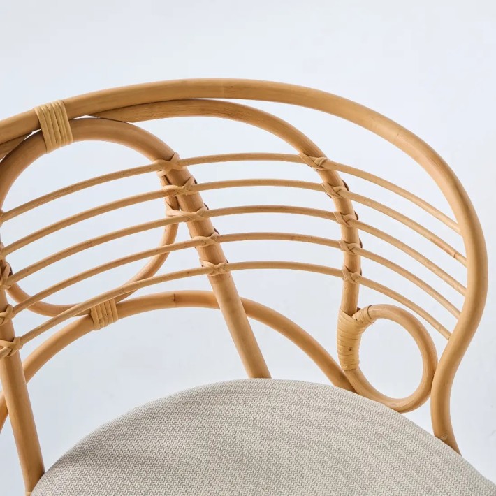 Detail of the backrest of the Gingko horizon rattan table armchair