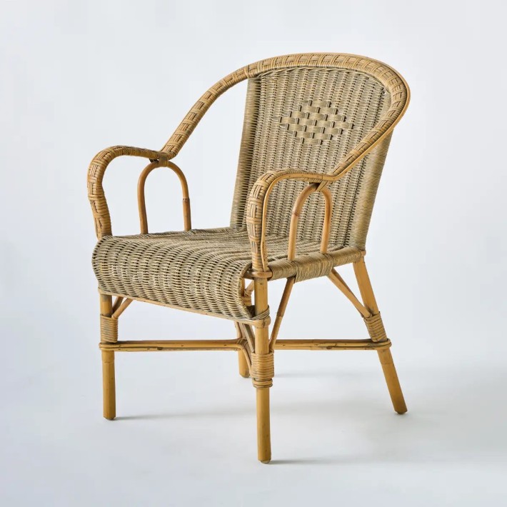Marcel armchair, unique piece in woven rattan with a patina finish