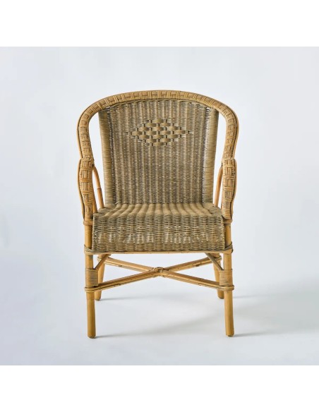 Vue de face fauteuil Marcel pièce unique en rotin tressé et patiné