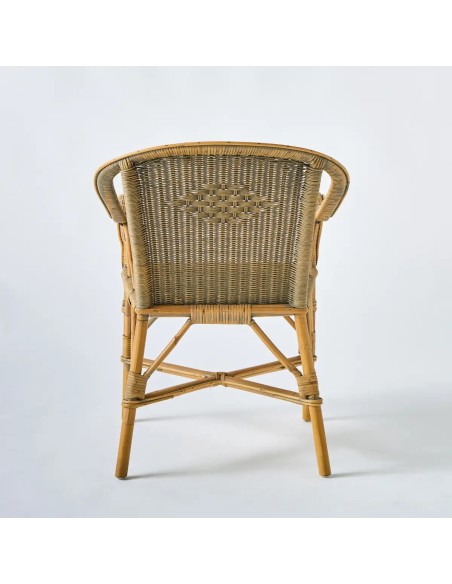 Back view of the Marcel armchair, a unique piece in woven rattan with a patina finish