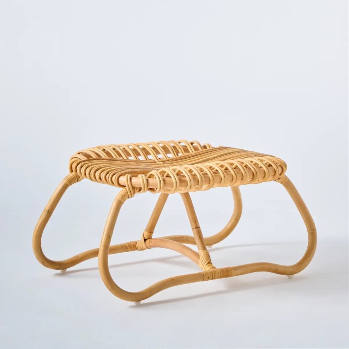 Rattan footrest from the Boucle collection