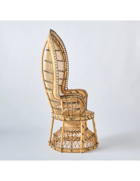 Profile of the iconic Emmanuelle rattan armchair