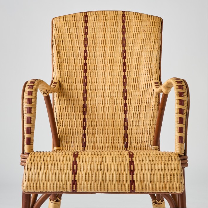 Front view Bagatelle high-back wicker armchair with red piping