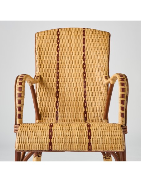 Front view Bagatelle high-back wicker armchair with red piping