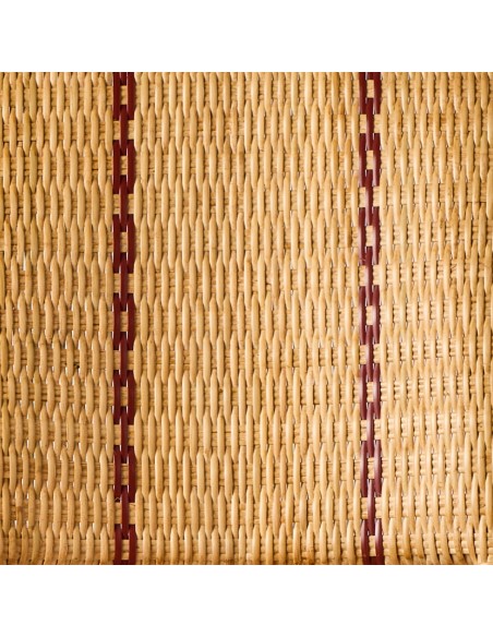Red border detail typical of the Bagatelle woven rattan collection
