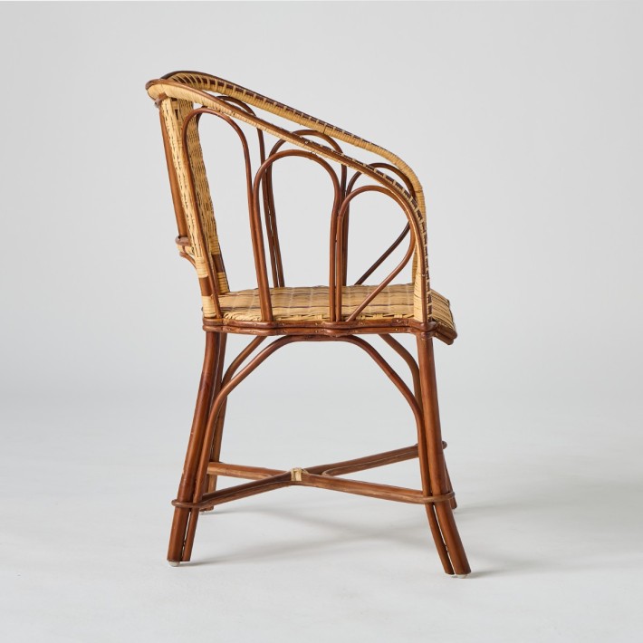 Profile of the Bagatelle collection rattan table armchair
