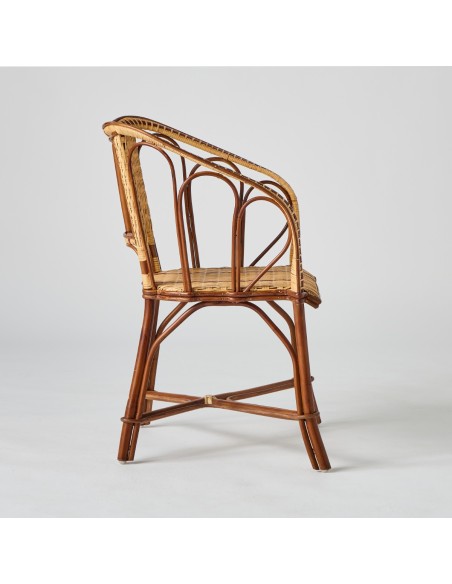 Profile of the Bagatelle collection rattan table armchair