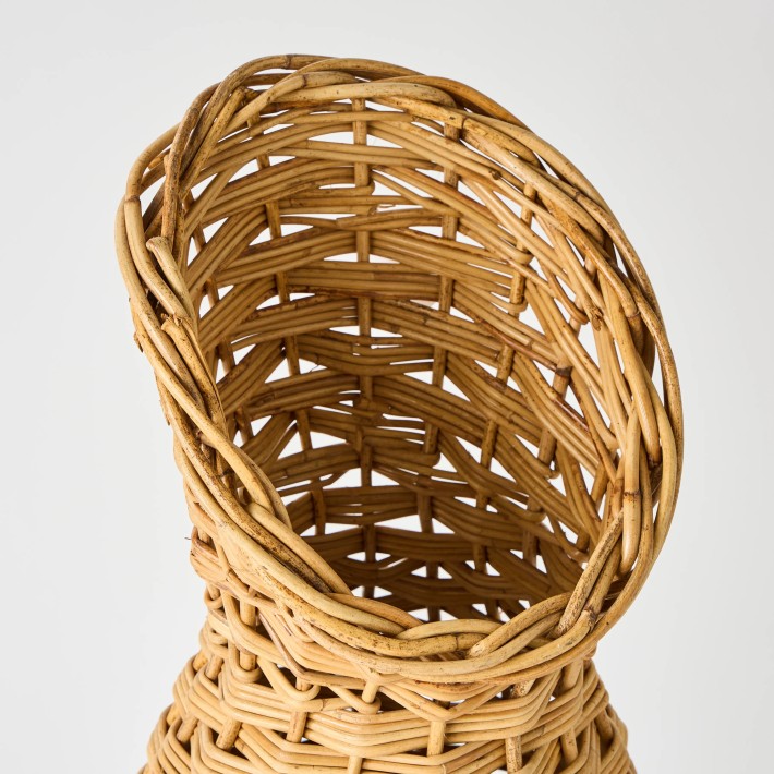 Close-up of a vintage workshop umbrella stand in rattan KOK MAISON