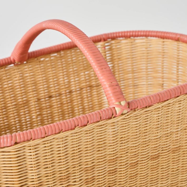 Detail of the weaving and handle of a rattan picnic basket from the Kok Maison workshop archive.