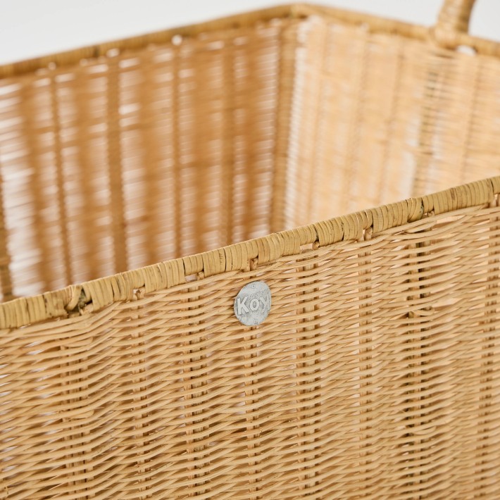 Close-up detail of weaving and logo  kok maison laundry basket unique vintage piece