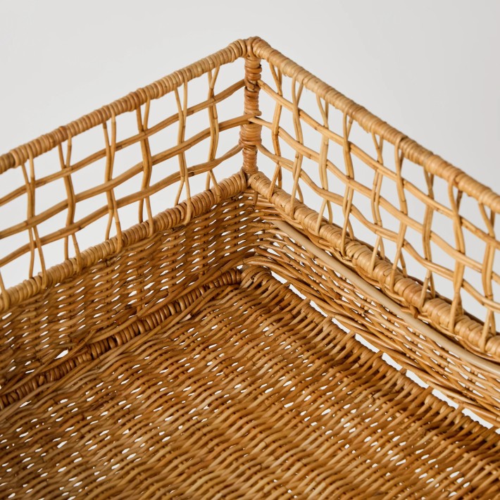 Detail of rattan weaving on metal structure, KOK MAISON workshop archive
