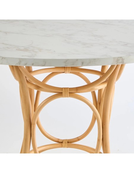 Detail of front view of semi-circular rattan dining table from the GINGKO collection at KOK maison