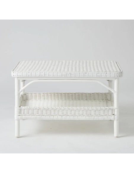Front view of rectangular coffee table in white lacquered rattan from the Primavera collection with under-shelf from KOK maison
