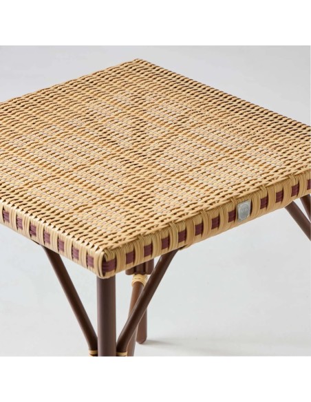 Zoom on the woven resin tray of the square coffee table from the Belle Epoque collection at Kok Maison.