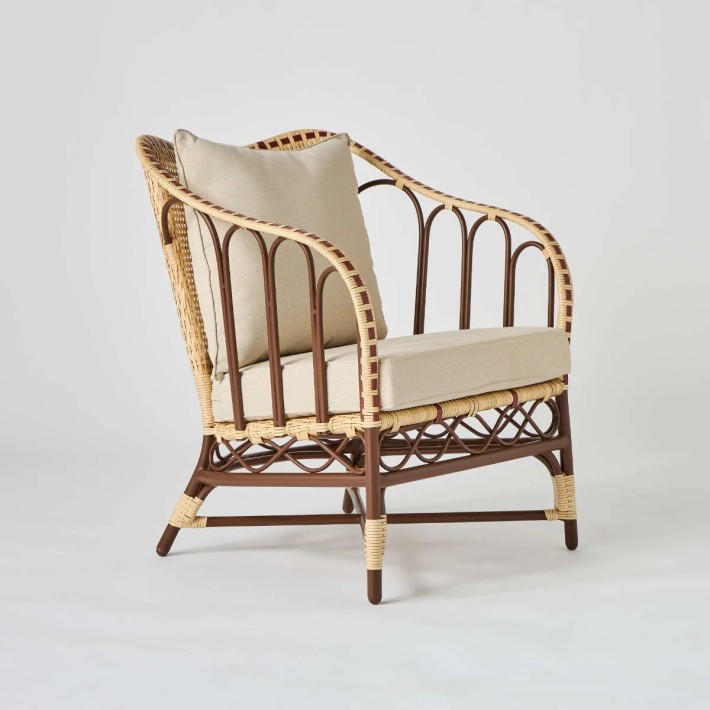 Garden armchair with woven resin cushions from the Belle Epoque collection at KOK maison