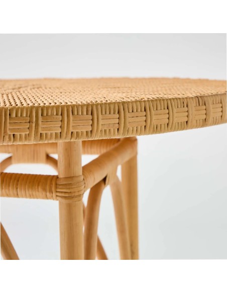 Zoom on the woven detail of the rattan tabletop of the Eugénie table in honey colour, exclusively available online.