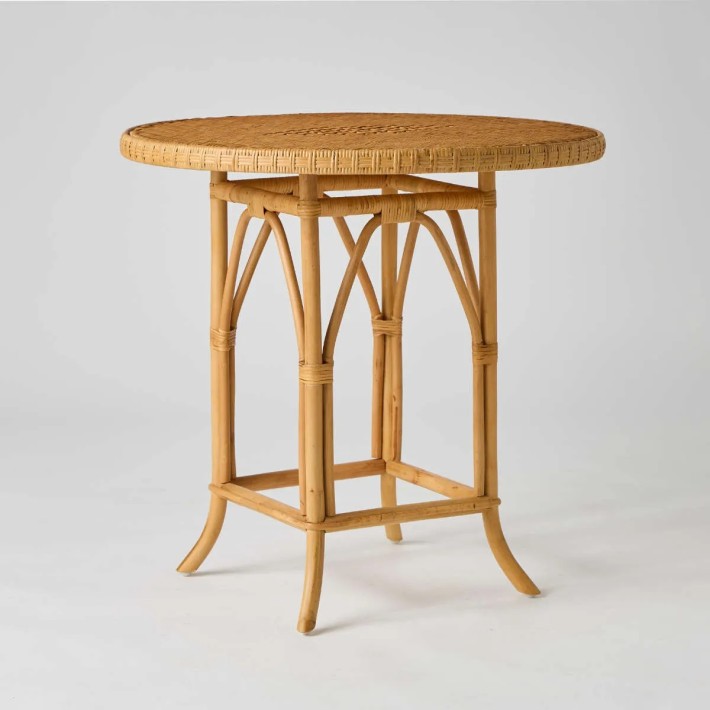 Honey-coloured rattan dining table Eugénie grandfather collection at KOK maison