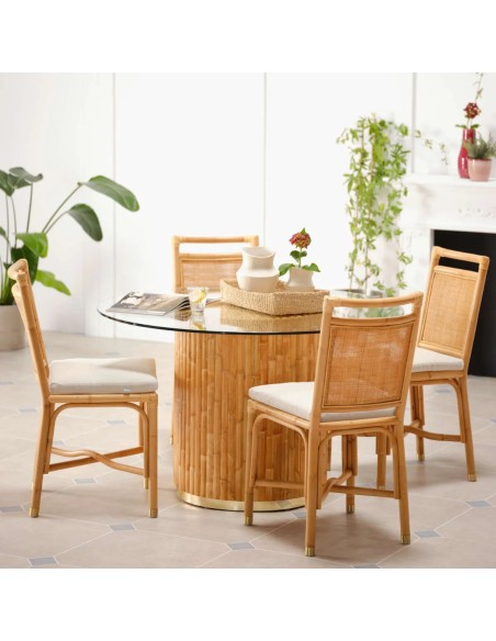 Ambience with rattan chairs and linen cushions from the RIVIERA collection at KOK MAISON