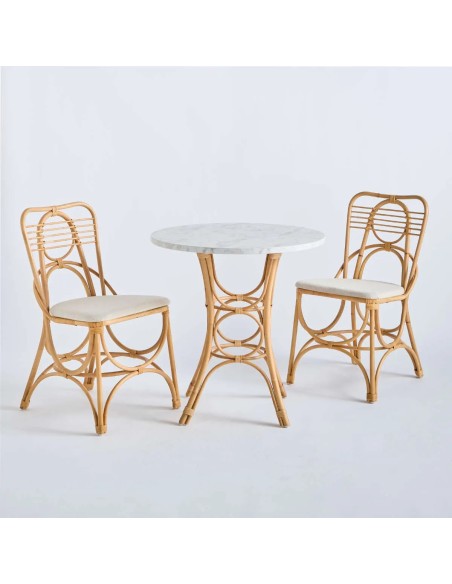 Gingko Horizon rattan chairs around the Gingko rattan pedestal table