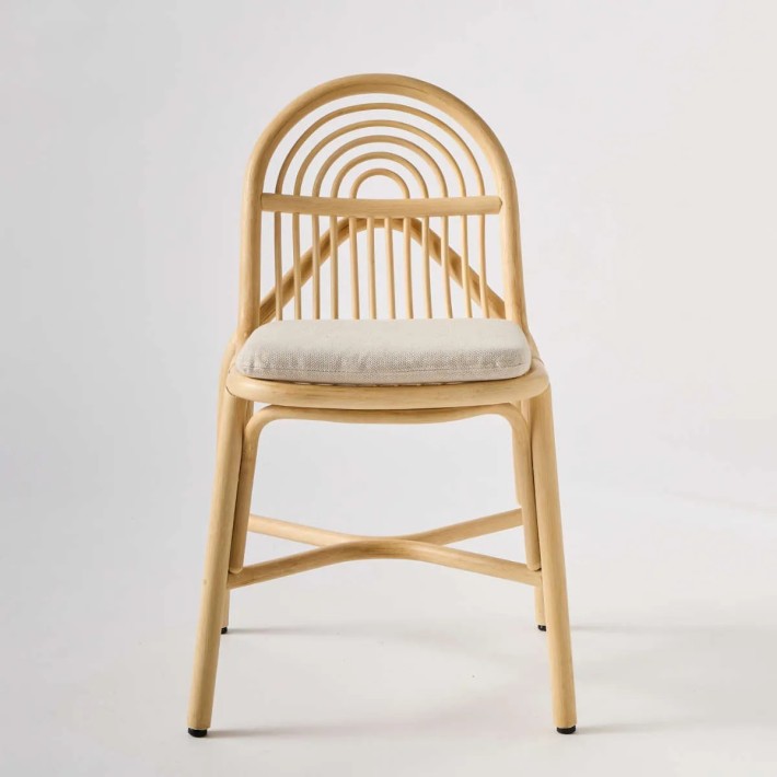 Front view of the Rattan Sillon chair from the Orchid Edition collection. Modern rattan by Kok Maison.