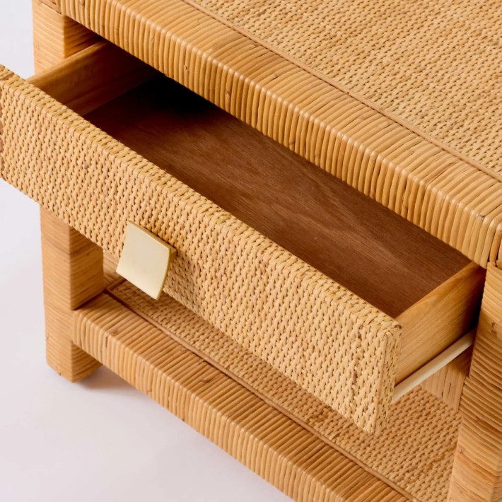 Detail of rattan bedside drawer from the SAIGON collection with brass handle