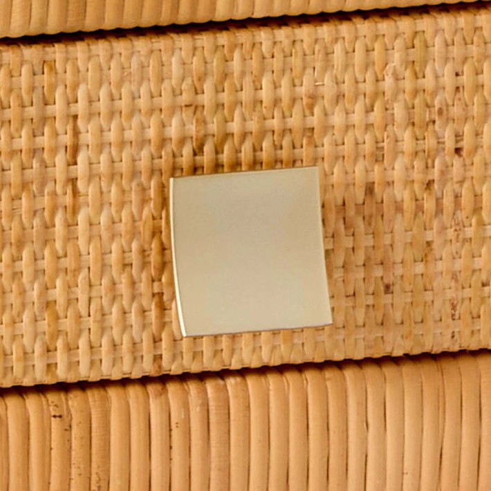 Zoom in on the gold-coloured brass handle of the SAIGON rattan bedside table by KOK MAISON