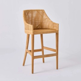 Rattan bar stool with teak legs from the SAIGON collection