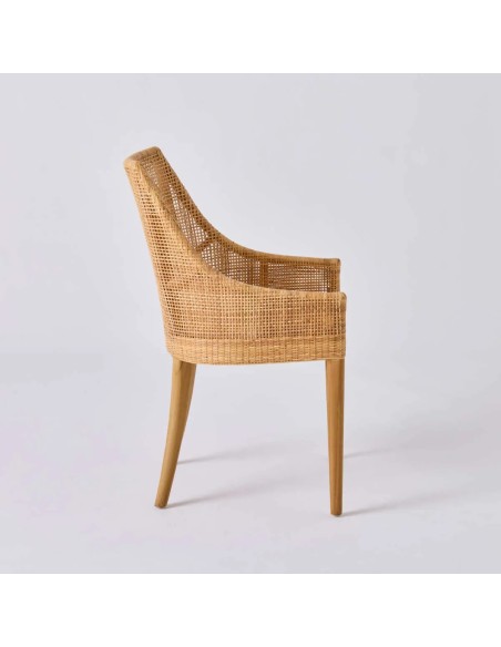 Profil fauteuil de table en rotin tressé et pieds en teck. Collection Saïgon par KOK MAISON