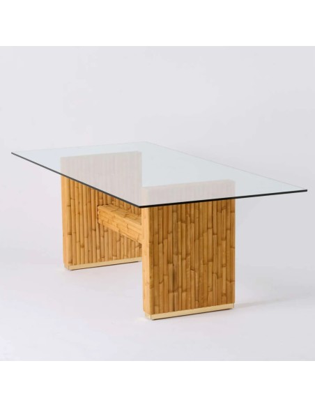 Three-quarter view of rectangular rattan table with glass top Riviera at KOK MAISON