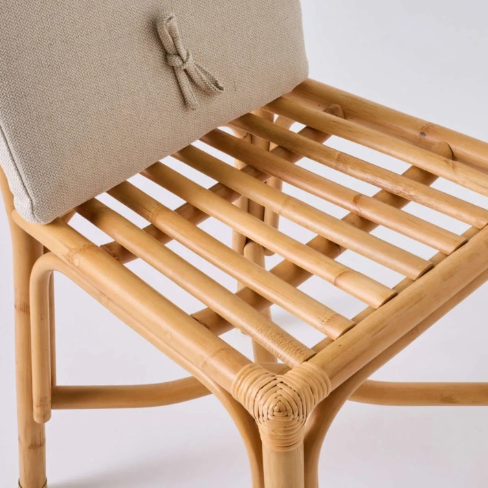 Detail of seat and cushion attachment on Riviera rattan chair