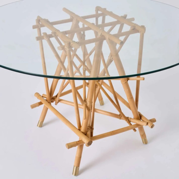 Bird's-eye view of Mikado rattan table with glass top at Kok Maison