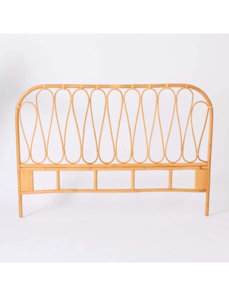 Vue de face tête de lit Volute tout en rotin chez Kok Maison