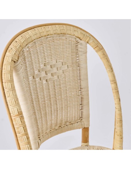 Detail of the woven backrest of the Albertine chair with its iconic diamond pattern